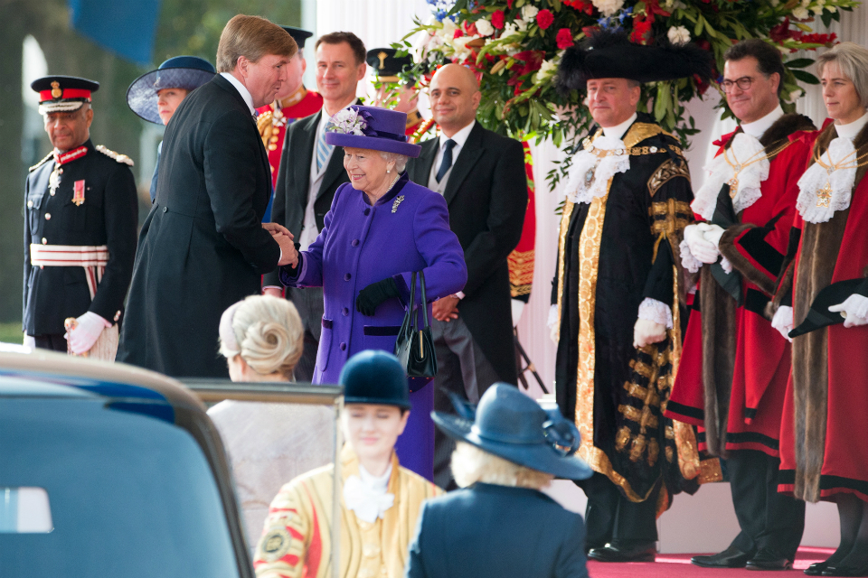 Her Majesty The Queen shaking hands with King Willem-Alexander on his arrival in Horseguards Parade