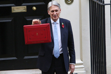 Chancellor outside No.11 with Budget box