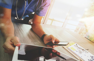 Doctor with tablet