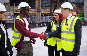 Picture of Jo Johnson with apprentices at Battersea Power Station.
