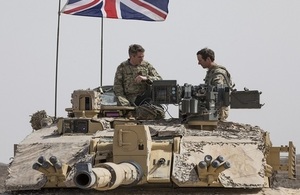 Defence Secretary Gavin Williamson on board a Challenger MKII tank following the Exercise Saif Sareea 3 firepower demonstration.