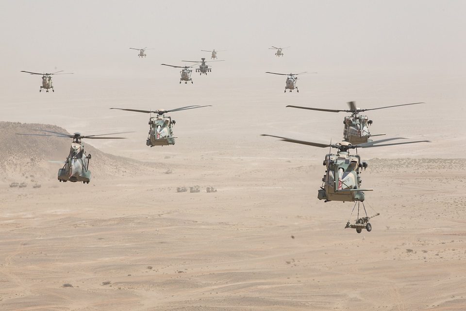 Royal Omani Air Force helicopters take part in the Exercise Saif Sareea 3 firepower demonstration. One is seen carrying a 105mm gun.