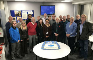 Flood wardens and a cake