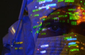 A radar operator in the operations room onboard a Type 23 frigate HMS Monmouth