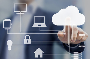 Businessman touching a cloud connected to many objects on a virtual screen, concept about internet of things
