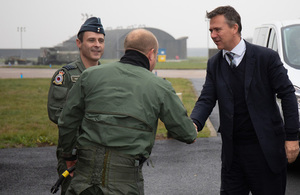 Minister for the Armed Forces Mark Lancaster is greeted on arrival at RAF Coningsby