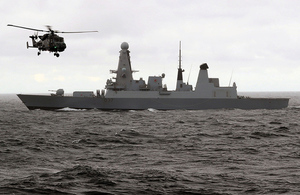 HMS Duncan with Wildcat helicopter. Crown copyright.