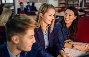 Teacher with students.