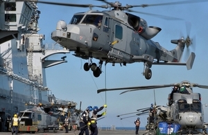 NATO troops arriving in a helicopter to begin Exercise Trident Juncture.