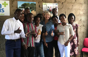Minister Baldwin meets young people during her visit to Mozambique.