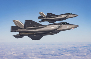 Two RAF F-35B Lightning break away together over the North Sea.