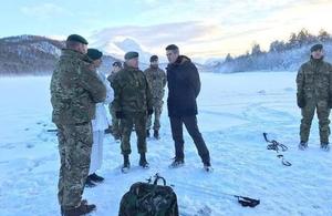 Defence Secretary Gavin Williamson speaks to Royal Marines and Norwegian personnel on winter training in Norway.