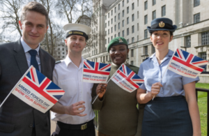 Defence Secretary Gavin Williamson with Service personnel celebrating 100 days to go until Armed Forces Day