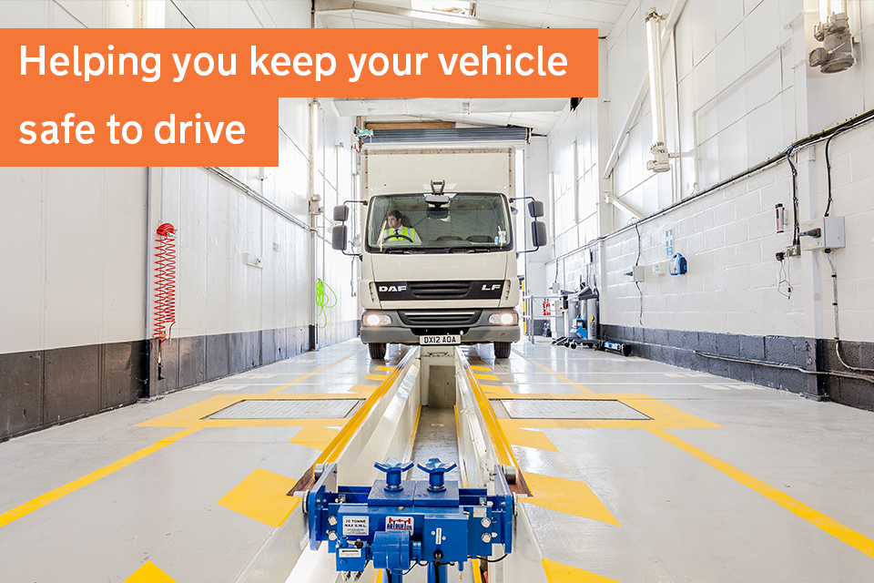 Image of a lorry over a vehicle testing pit, with a banner reading 'Helping you keep your vehicle safe to drive' overlaid on the image