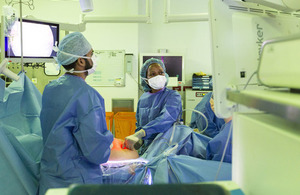 Surgeons operating on a patient