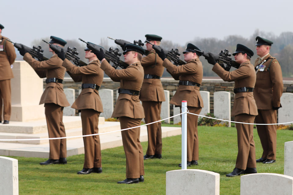 The firing party from 1 RIFLES fire a salute to Private Burt, Crown Copyright, All rights reserved