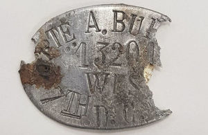 An ID tag that was found with the remains that helped the JCCC identify Pte Burt’s remains, Crown Copyright, All rights reserved