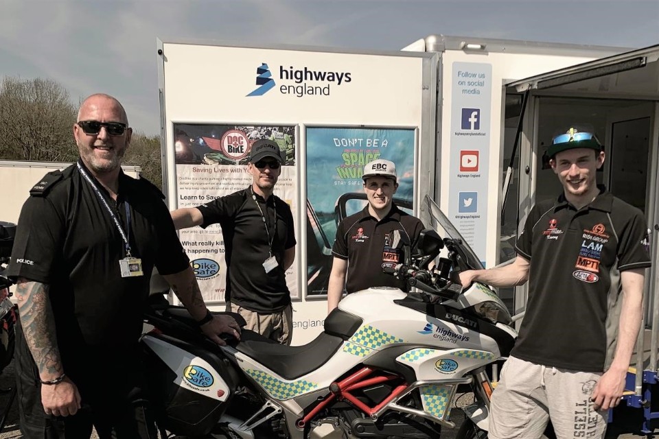 Riders Matt and Kurt Wigley check out a BikeSafe Ducati with Special Constable Jason Leadbetter and Sgt Rob Gilligan at the Highways England stand