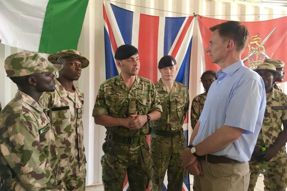 The Foreign Secretary meeting British and Nigerian soldiers.