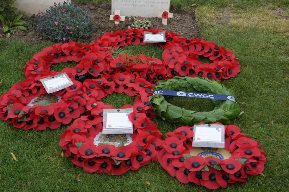 Wreaths lie in front of Pte Foskett’s headstone, Crown Copyright, All rights reserved.