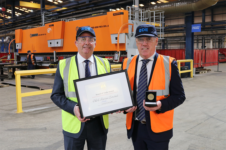 Dr Liam Fox MP presents CDE with a Board of Trade Award (BOFTA)