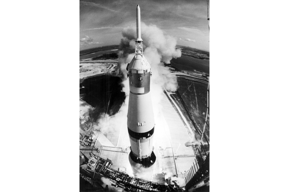 Saturn V rocket taking off