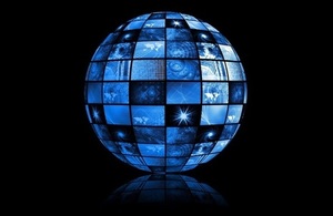 Black background with a blue globe constructed of screens showing various abstract images