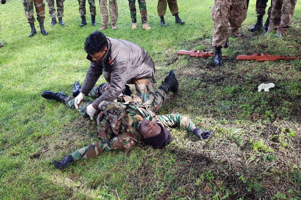 Captain Boateng (Ghana) as the casualty with WO Prakash (India).