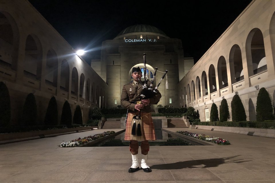 Bagpiper plays at our D-Day 75 Commemoration at the Australian War Memorial.