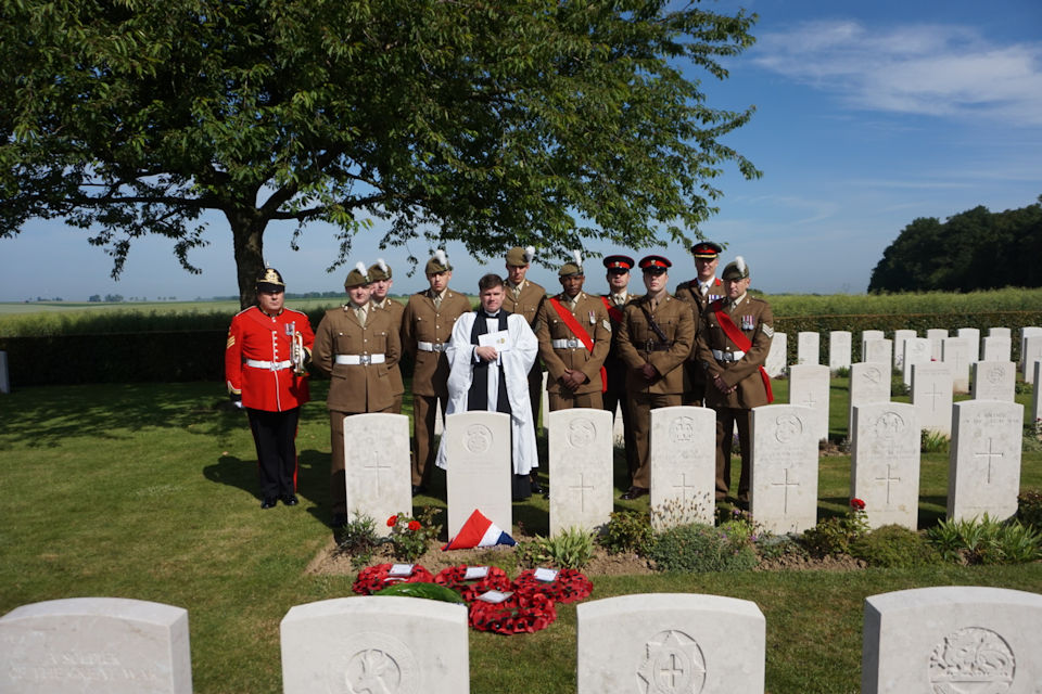 The military party gather at the graveside of Cpl Davies, Crown Copyright, All rights reserved