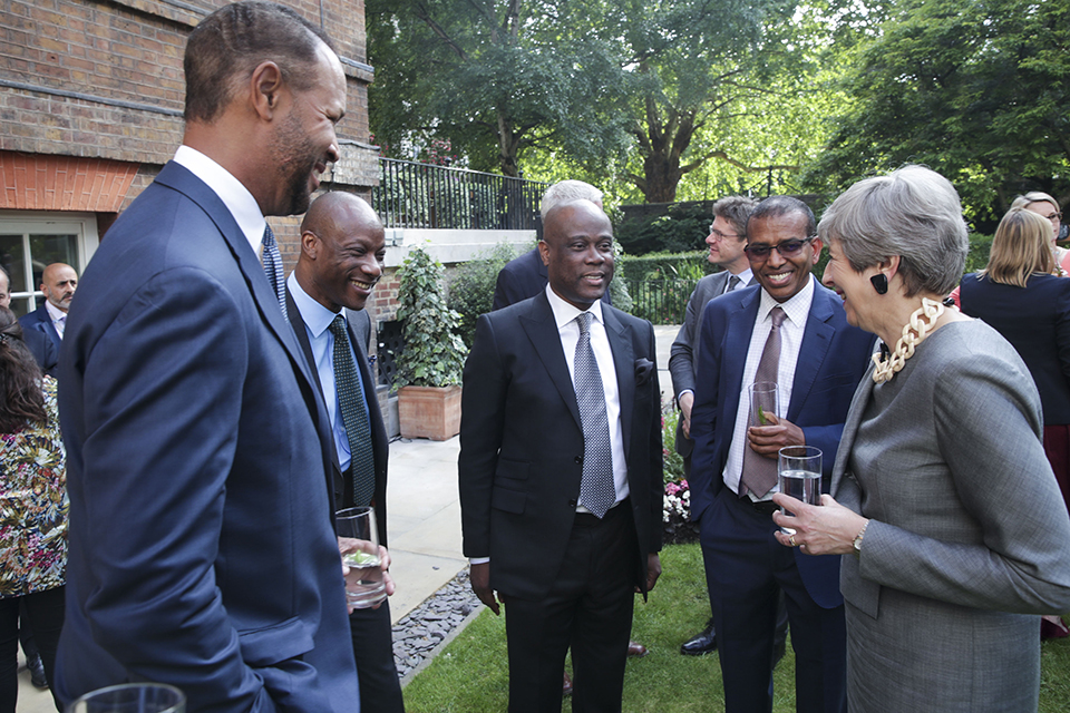 Prime Minister Theresa May speaking to business leaders at a reception in the Downing Street garden