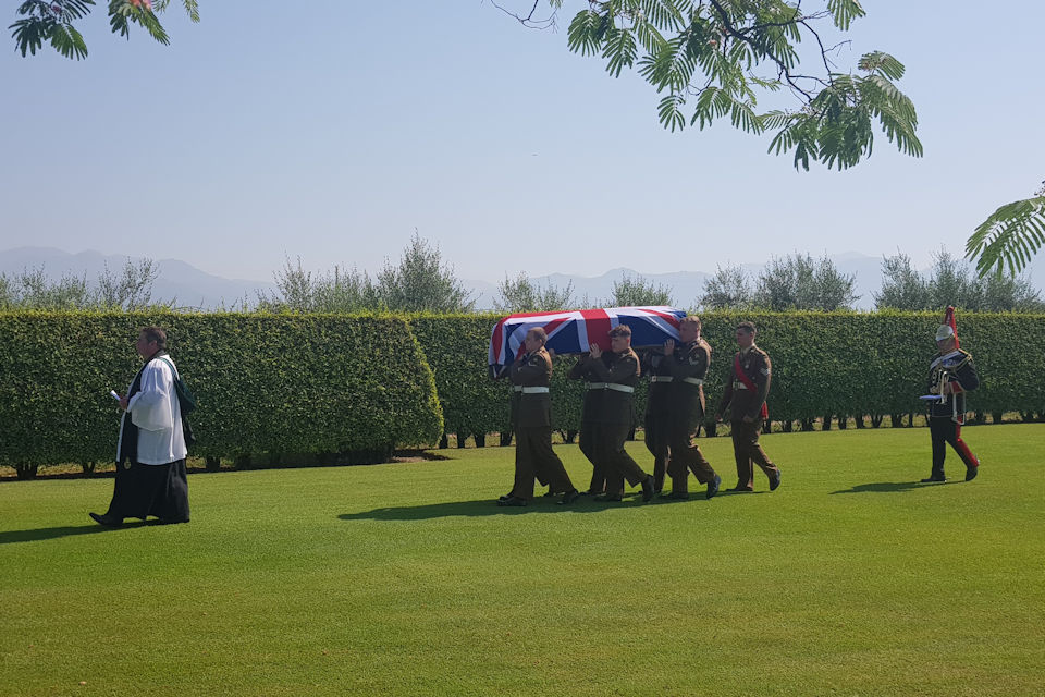 Members of the 2nd Battalion, RANG carry the coffin led by Padre Iorwerth Price and followed by Trumpet Major Matthew Screen, Band of the Household Cavalry, Crown Copyright, All rights reserved