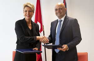 Home Secretary Sajid Javid and Swiss Federal Councillor Karin Keller-Sutter shake hands after signing an agreement to continue cooperation on internal security post-Brexit.