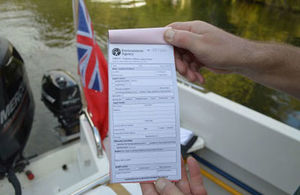 A bailiff writing a notice