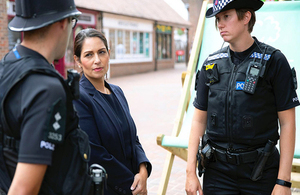 Home Secretary Priti Patel with officers from Essex Police