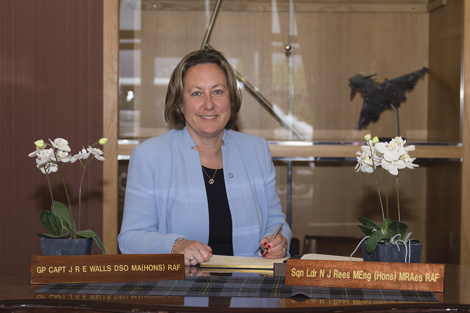 Defence Minister Anne-Marie Trevelyan signing the RAF Lossiemouth visitors' book.