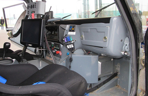 Interior view of prototype self-driving car, showing dashboard systems