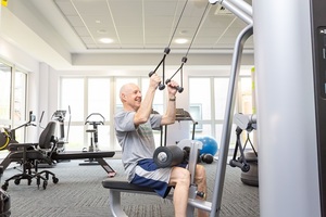Man doing strength exercises in gym