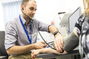 Doctor examining patient