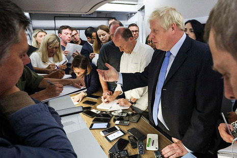 PM Boris Johnson briefing the media on the way to UNGA
