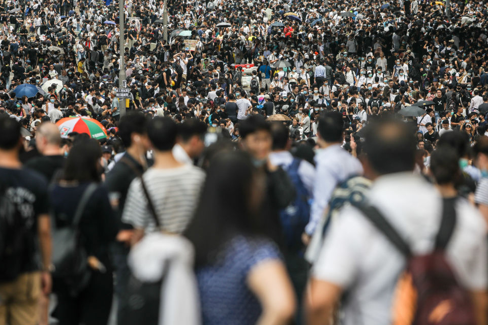 People walking in a crowd in Hong Kong