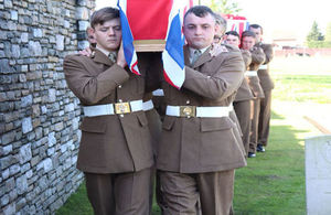 Members of the 1st Battalion The Royal Regiment of Fusiliers escort their former comrades into the cemetery. Crown Copyright unless otherwise stated