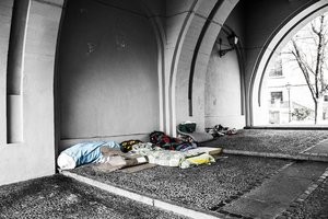 Sleeping bags underneath a bridge