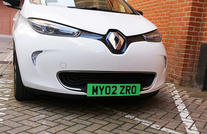 Picture of a car with the proposed green licence plate.