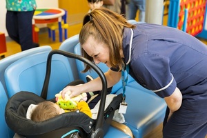 Nurse looking after a baby