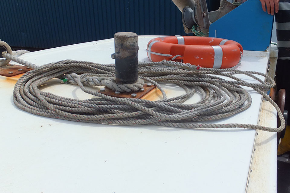 Lifebuoy and polysteel rope on the vessel