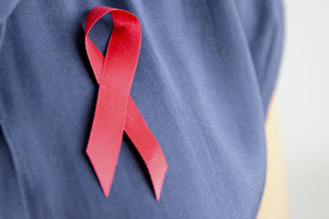 Red ribbon on a nurses uniform