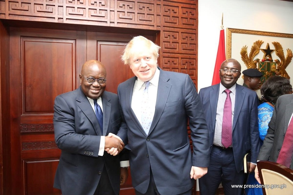 An image of H.E. Nana Akufo Addo, President of Ghana shaking hands with British PM Boris Johnson