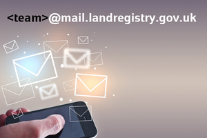 Envelope icons floating above a mobile phone and under the words 'team@mail.landregistry.gov.uk'