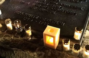 A Holocaust Memorial consisting of a lit candle